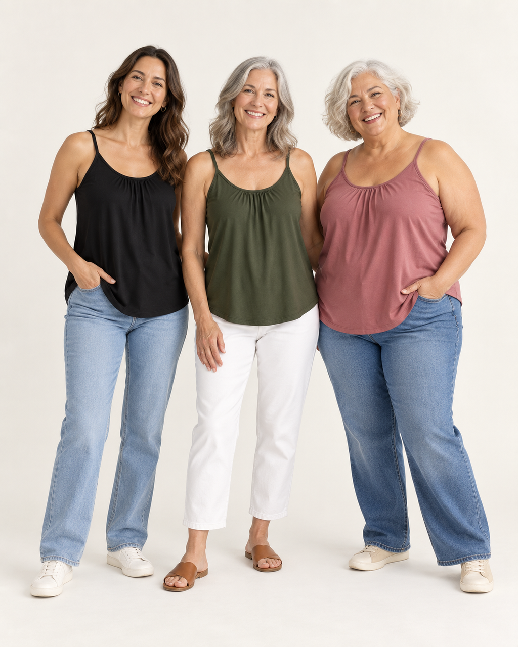 Three women wearing the Everyday Tank in different sizes, S to 6XL
