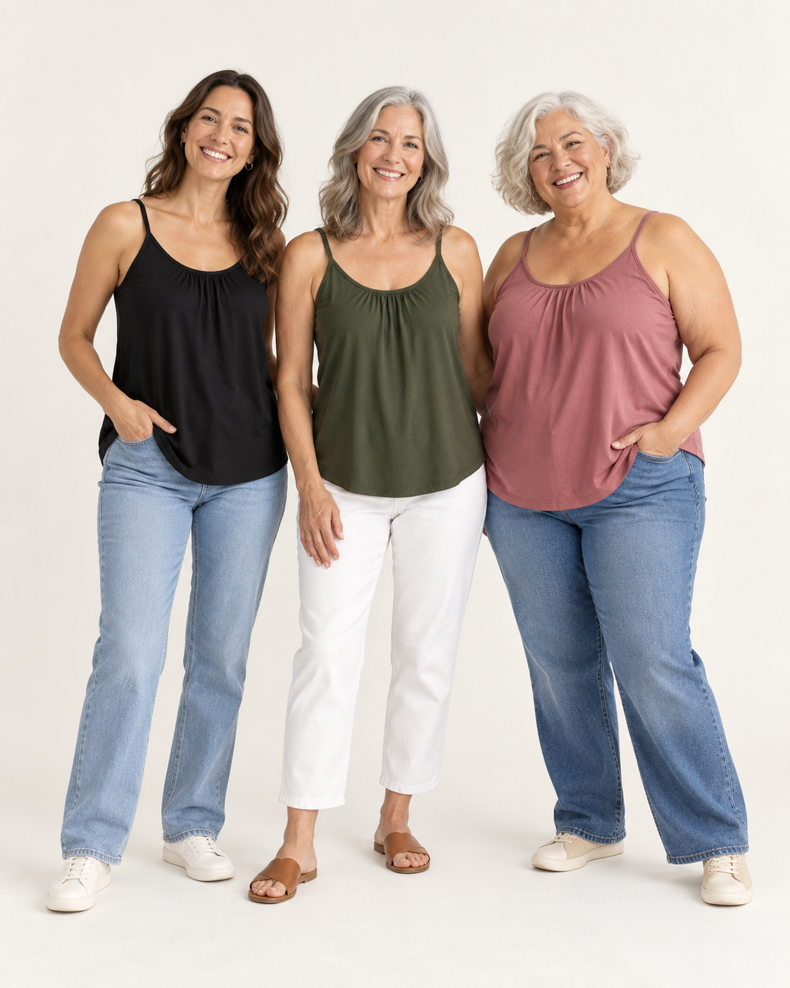 Three women wearing the Everyday Tank in different sizes, S to 6XL
